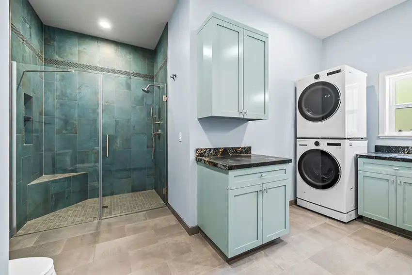 ADU bathroom with teal tile walk-in shower