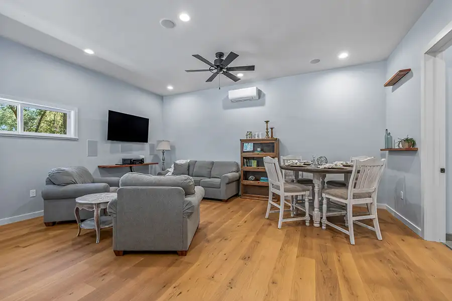ADU living and dining area with hardwood floors