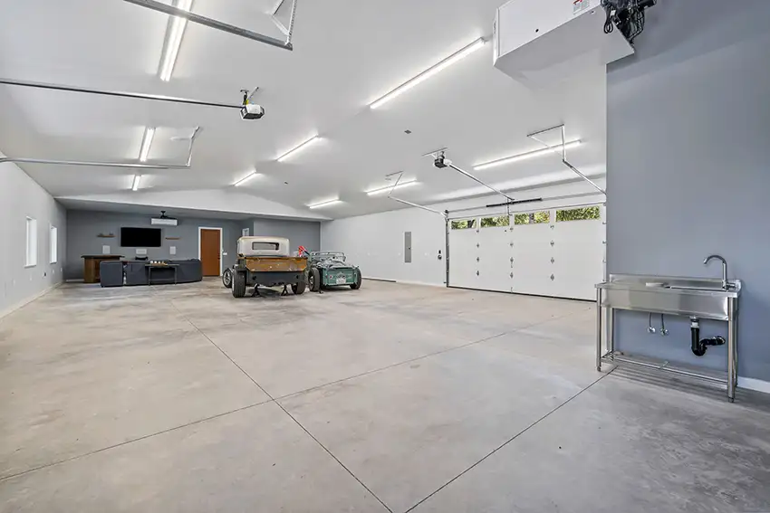 Custom garage interior with dual doors and classic cars